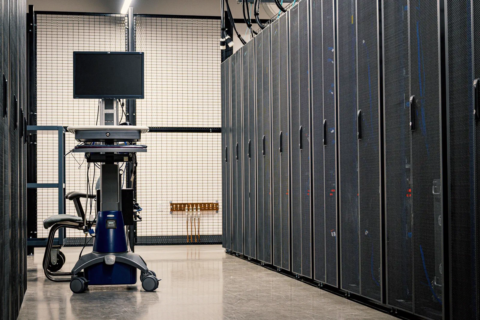 Commercial-use reference photograph of data-center infrastructure used to show the downstream cooling boundary