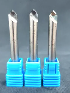 Three DiamovaLab diamond chamfer tools with angled cutting tips